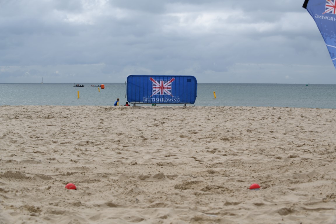 British Rowing banner on a beach